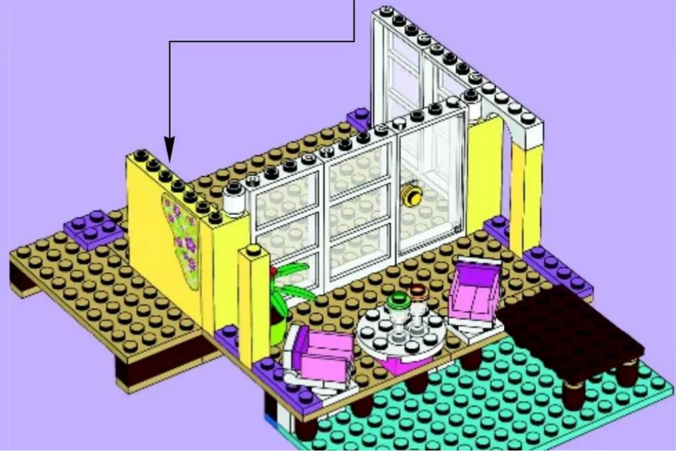 3D architectural diagram of a LEGO building interior with visible walls, doors, and furniture (no text or symbols)