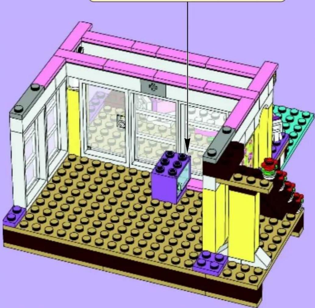 3D architectural rendering of a LEGO building with visible walls, windows, and a central storage unit (no text or symbols)