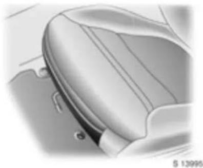 Close-up of a car seat cover and side panel, showing no text or symbols