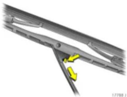 Mechanical assembly diagram showing a bracket with yellow directional arrows indicating movement or force (no text or symbols present)