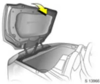Illustration of a car interior showing a lid with a yellow arrow pointing to the lid (no text or symbols)