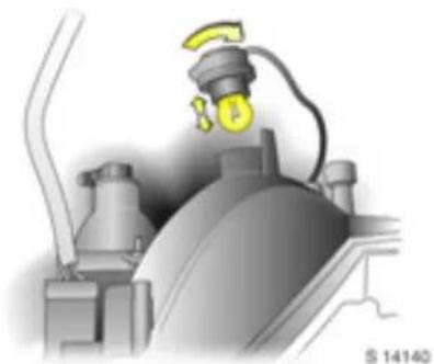 Mechanical component diagram showing a yellow valve attached to a housing (no text or symbols visible)