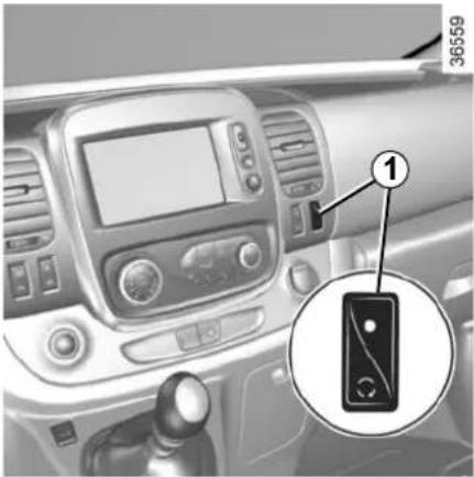 Interior view of a car dashboard with a touchscreen device and a close-up of the control panel (no visible text or symbols)