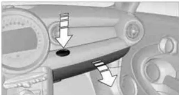Interior view of a vehicle dashboard with steering wheel, speedometer, and control panel (no visible text or symbols)
