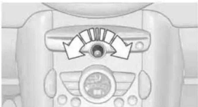 Top-down view of a car dashboard with directional arrows indicating airflow or movement (no text or symbols)