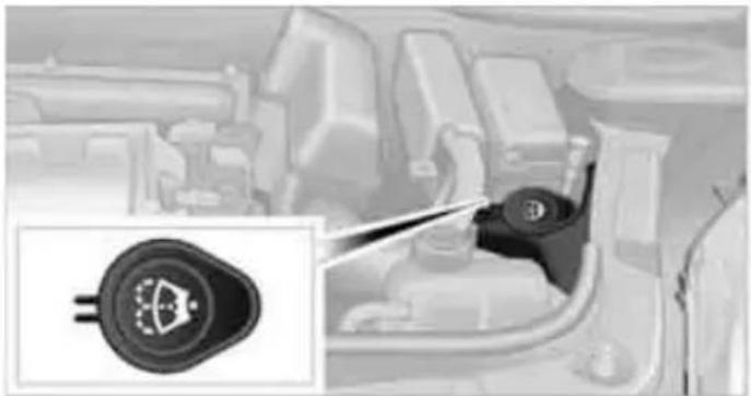 Interior view of a vehicle showing a car's head panel and a close-up of the engine component (no visible text or symbols)