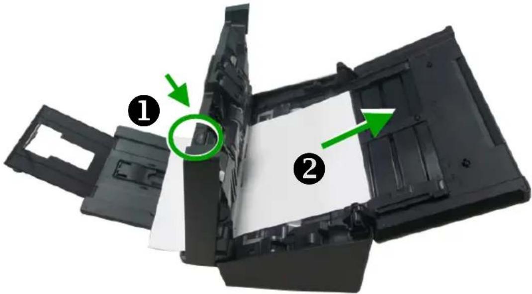Diagram of a printer's internal structure with labeled parts and green arrows indicating features