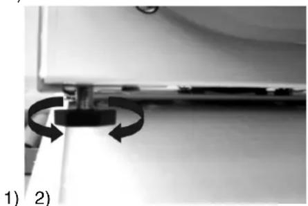 Close-up of a mechanical component with two curved arrows indicating rotation or assembly (no visible text or symbols)