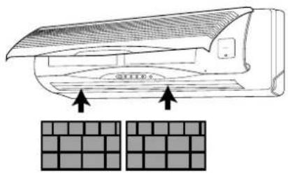 Diagram of a small air conditioner unit with two grid panels below, showing airflow direction (no text or symbols)