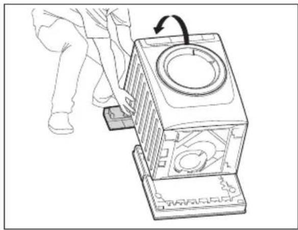 Line drawing of a person using a mechanical device to lift a circular component, with an arrow indicating rotation (no text or symbols present)