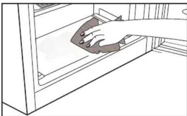 Line drawing of a hand cleaning a shelf with a cloth. No text or symbols.