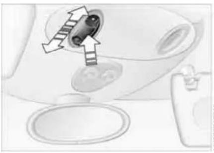 Diagram showing a device with directional arrows and a circular component, no visible text or symbols