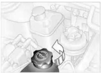 Illustration of a mechanical component with a gear and directional arrow (no text or symbols)