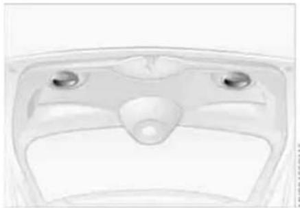 Top-down view of a medical device casing with two circular ports and a central trough (no text or symbols visible)