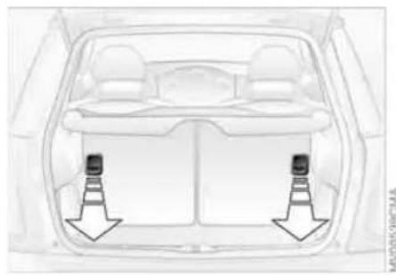 Top-down view of a car backrest with two side-mounted sensors and directional arrows indicating alignment (no text or symbols)