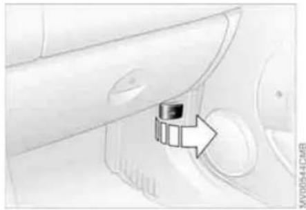 Close-up of a mechanical component with a directional arrow indicating rotation (no text or symbols)