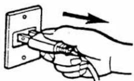 Hand inserting a cable into an electrical outlet with a power cord (no text or symbols visible)