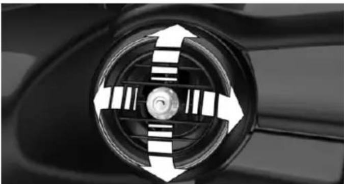 Close-up of a car wheel with directional arrows indicating clockwise motion (no text or symbols)