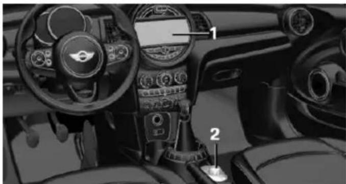 Interior view of a car dashboard and steering wheel (no visible text or symbols)
