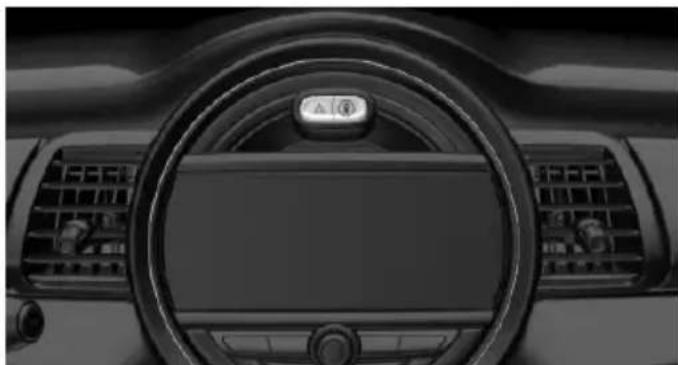 Interior view of a car dashboard with steering wheel and air conditioner (no visible text or symbols)