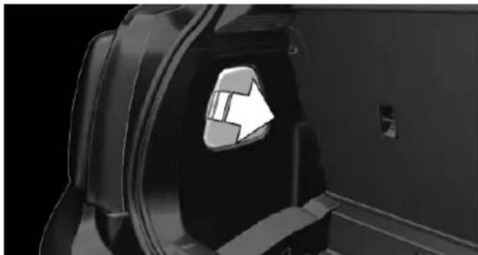 Close-up of a mechanical component with a white arrow symbol pointing to a circular opening (no text or symbols visible)