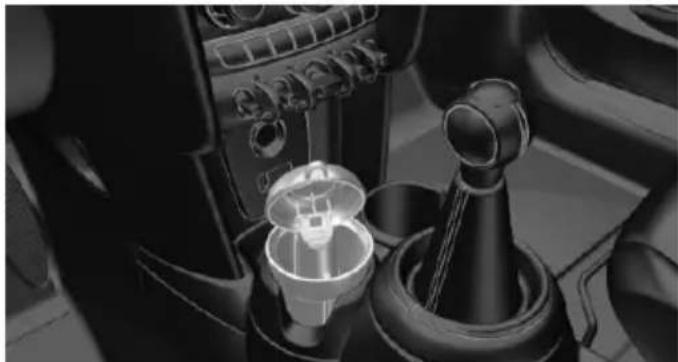 Interior view of a car gear shift lever and intake manifold (no text or symbols visible)