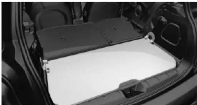 Interior view of a car showing the backrest panel and dashboard (no visible text or symbols)