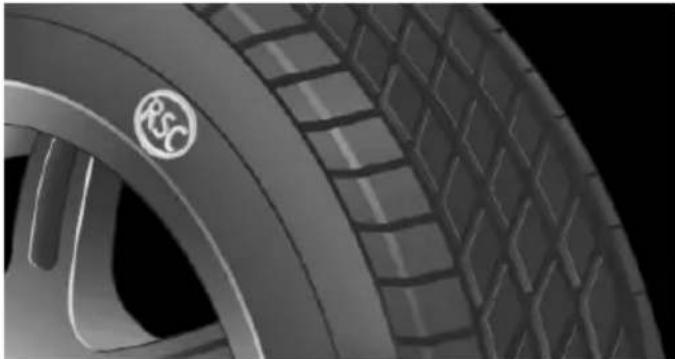 Close-up of a car tire with a visible 'Rsc' logo on the wheel (no text or symbols beyond logo)