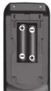 Close-up of a black electronic device casing with four circular battery cells, no visible text or symbols