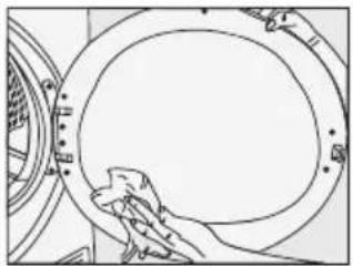 Line drawing of a hand cleaning a circular mechanical component (no text or symbols)