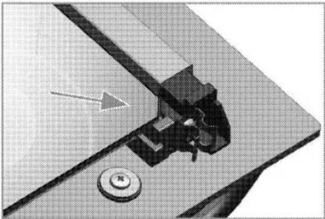 Mechanical assembly diagram showing a cutting tool interacting with a workpiece (no text or symbols visible)