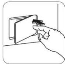 Line drawing of a hand inserting a small object into a device (no text or symbols)