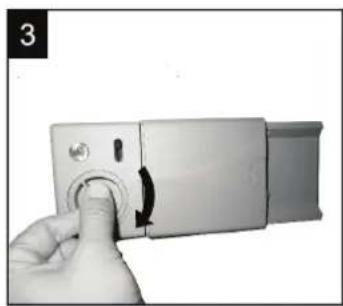 Hand inserting a button into a device (no text or symbols visible).