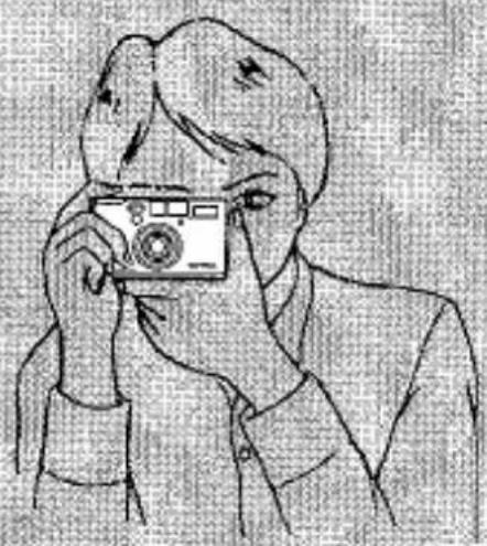 Dessin au trait d'une personne tenant un appareil photo (aucun texte ou symbole).