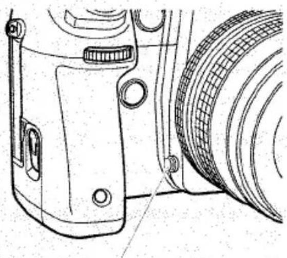 Dessin technique d'un appareil photo avec objectif et molettes de réglage (sans texte ni symboles)