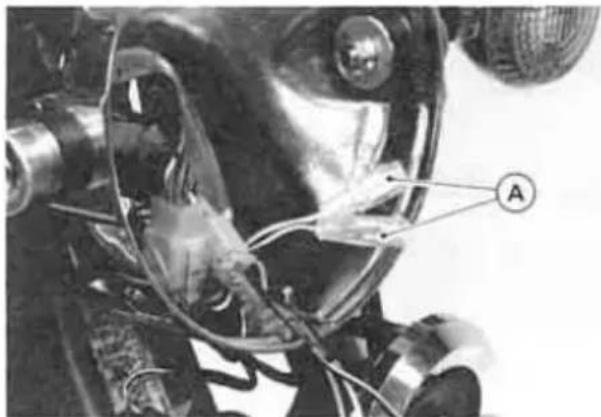 Close-up of a mechanical assembly with wires and components, no visible text or symbols