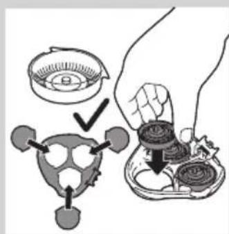 Diagram illustrating a hand holding a small object with a compass and a magnified view of the device, showing step-by-step instructions.