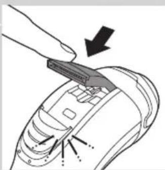 Diagram of a device being inserted into a component, showing a tool and arrow indicating direction (no text or symbols present)