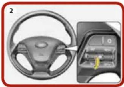Interior view of a car steering wheel and dashboard with a close-up of the dashboard panel (no visible text or symbols)