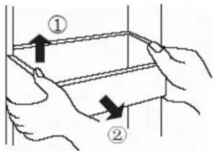 Diagram showing two hands holding a rectangular object with labeled arrows indicating movement or force directions.