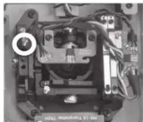 Close-up of an electronic component with wires and a circular annotation (no readable text or symbols)