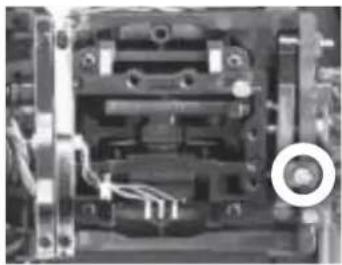 Close-up of an electronic component with visible internal structure and a circular annotation (no text or symbols)