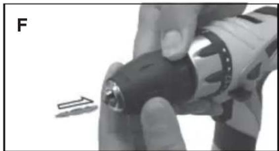 Close-up of a hand using a drill bit to press or install a screwdriver, with a tool partially visible (no text or symbols)