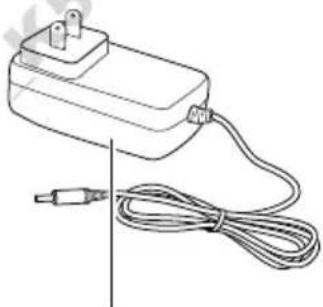Line drawing of a connected electrical adapter with a cable and connector (no text or symbols)
