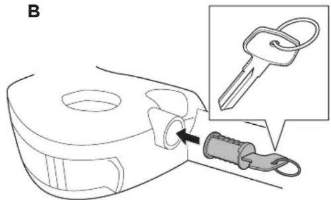 Diagram of a key inserted into a lock, with an inset showing the same key being inserted (no text or symbols present)
