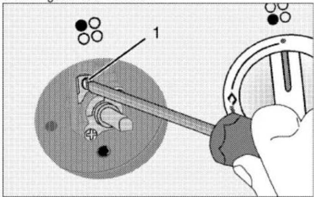Technical diagram showing a hand operating a tool to adjust or install a mechanical component, with numbered parts and circular components nearby.