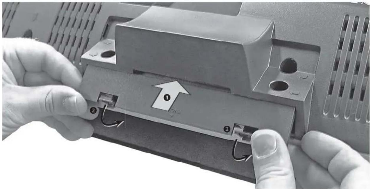Close-up of hands installing a component with numbered parts and directional arrows (no text or symbols visible)