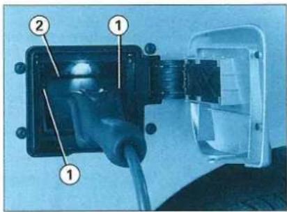 Labeled diagram of an electrical plug showing internal components and cable connections