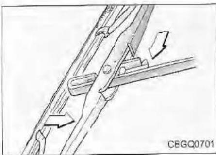 Technical diagram of a mechanical assembly with directional arrows indicating movement (no text or symbols present)