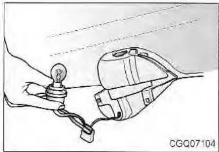 Simple line drawing of a hand holding a light bulb connected to a device with wires, no text or symbols present.